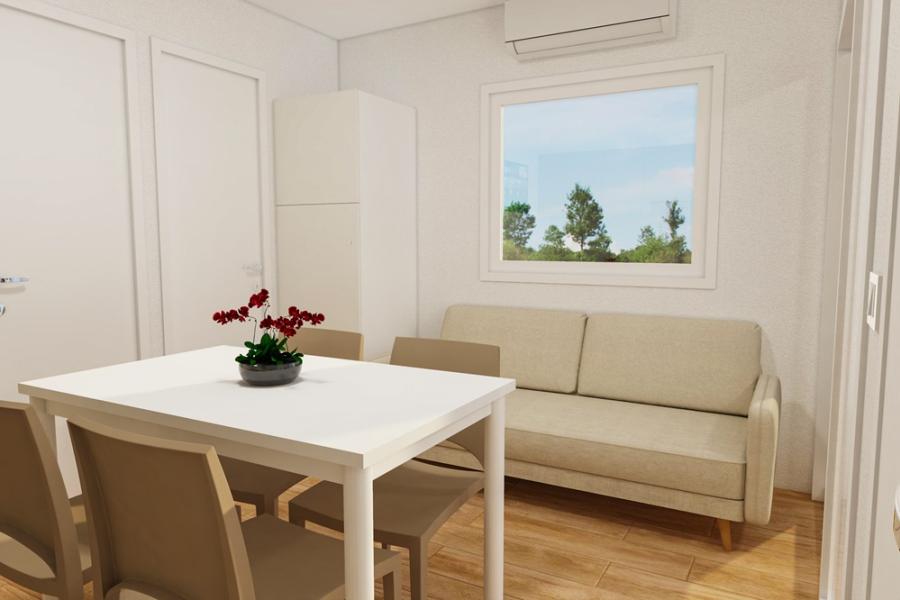 Modern living room with white table and beige sofa.